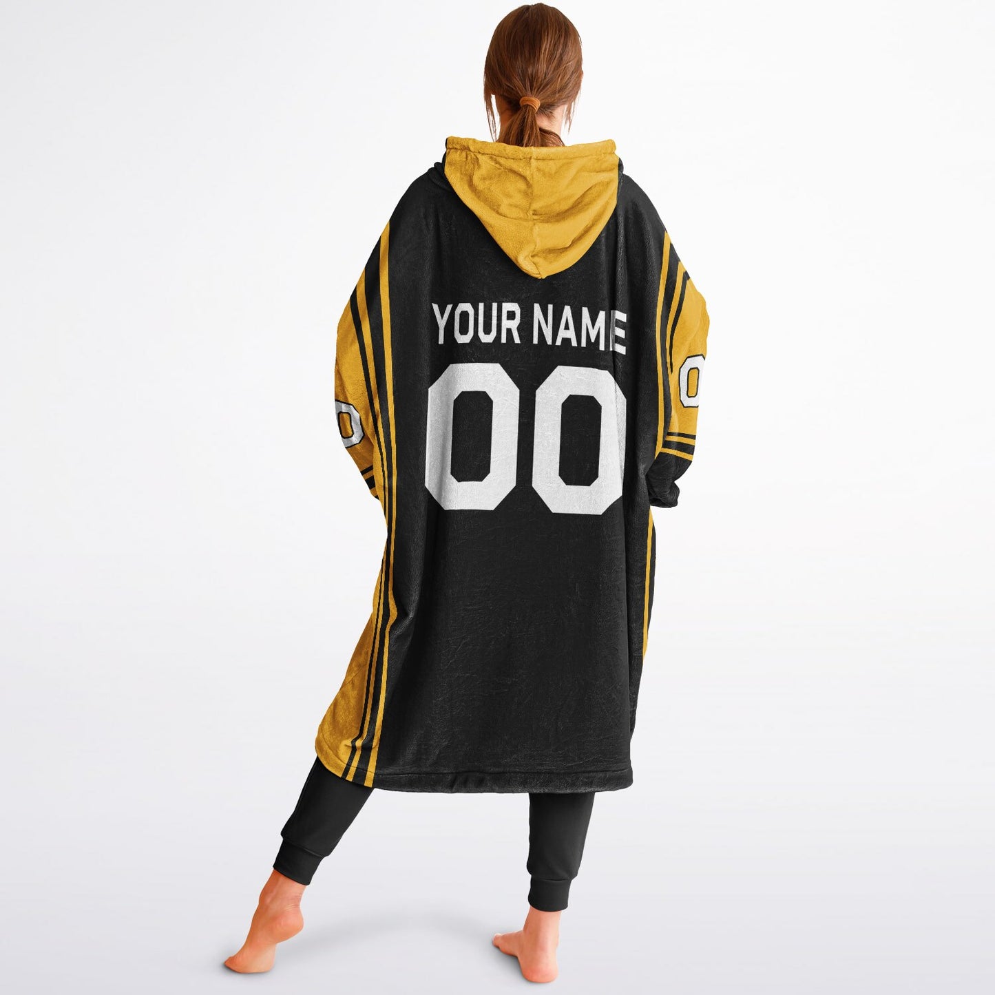 Black and gold bold snug hoodie with modern color-block design and soft loungewear fit.