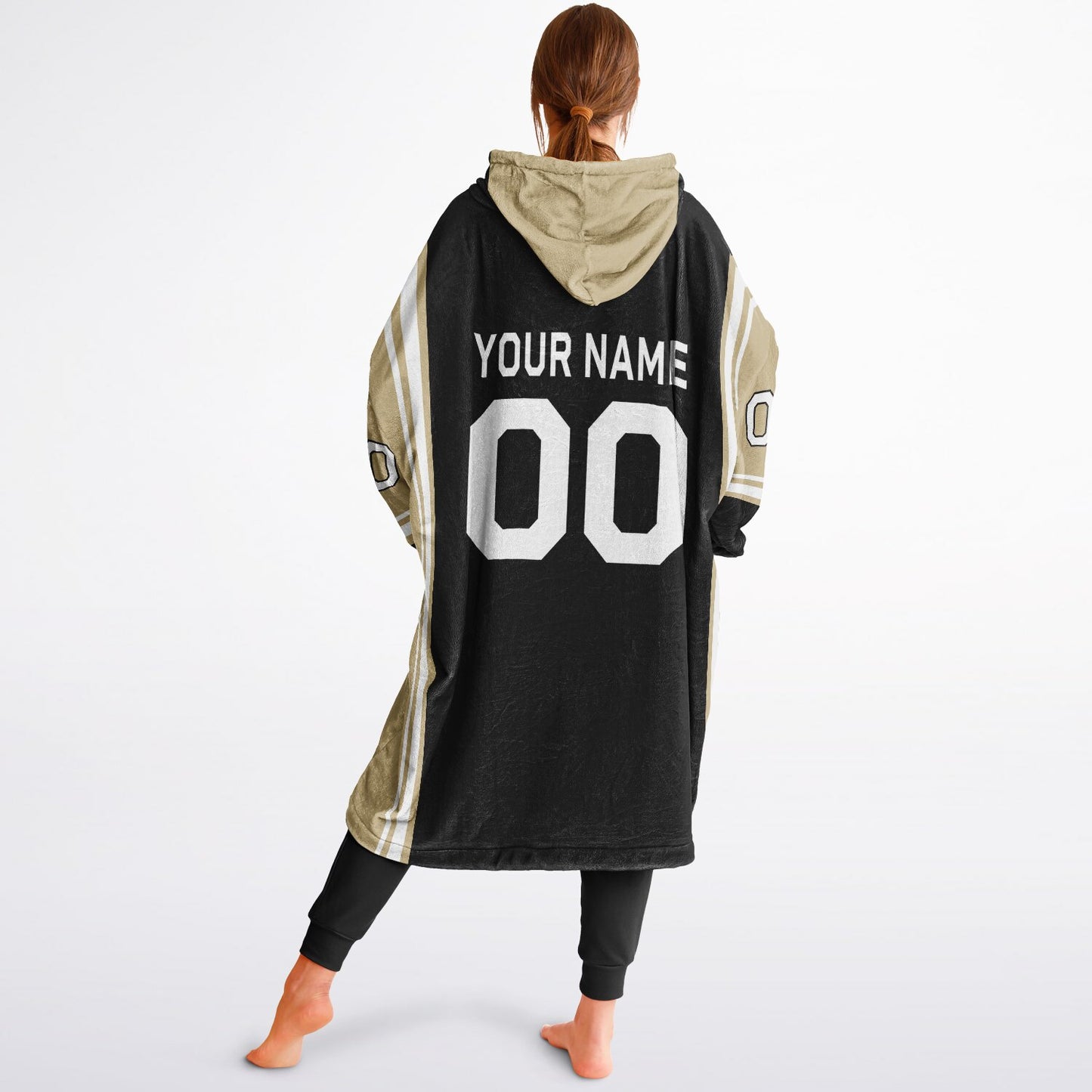 Black, old gold, and white bold snug hoodie with triple color blocking and a sporty aesthetic.