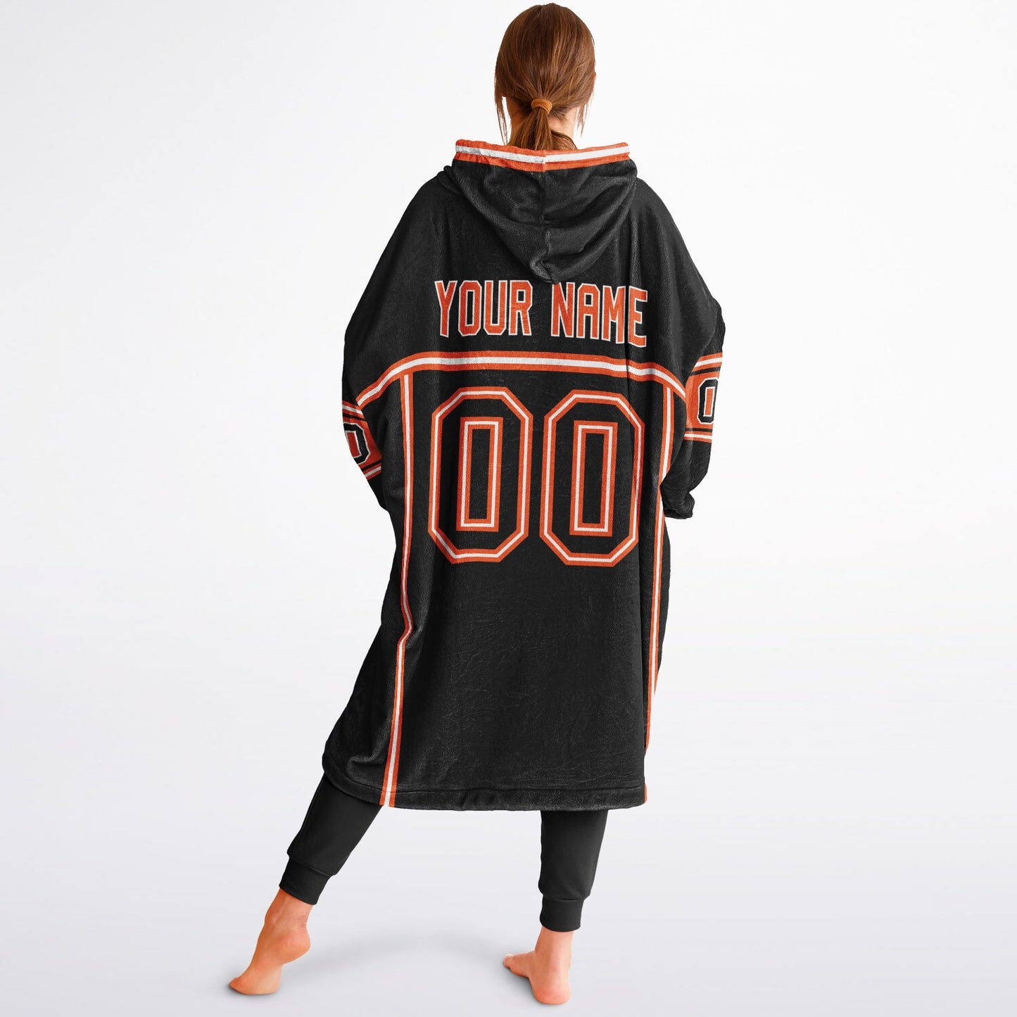 Black, orange, and white lineup snug hoodie with clean line work and subtle jersey influence.