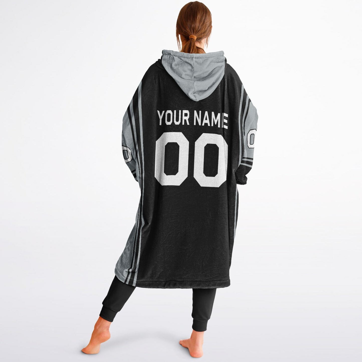 Black and silver bold snug hoodie with modern color-block design and soft loungewear fit.