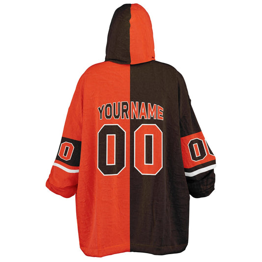 Brown, orange, and white halftime snug hoodie with three-tone split design and cozy fleece texture.