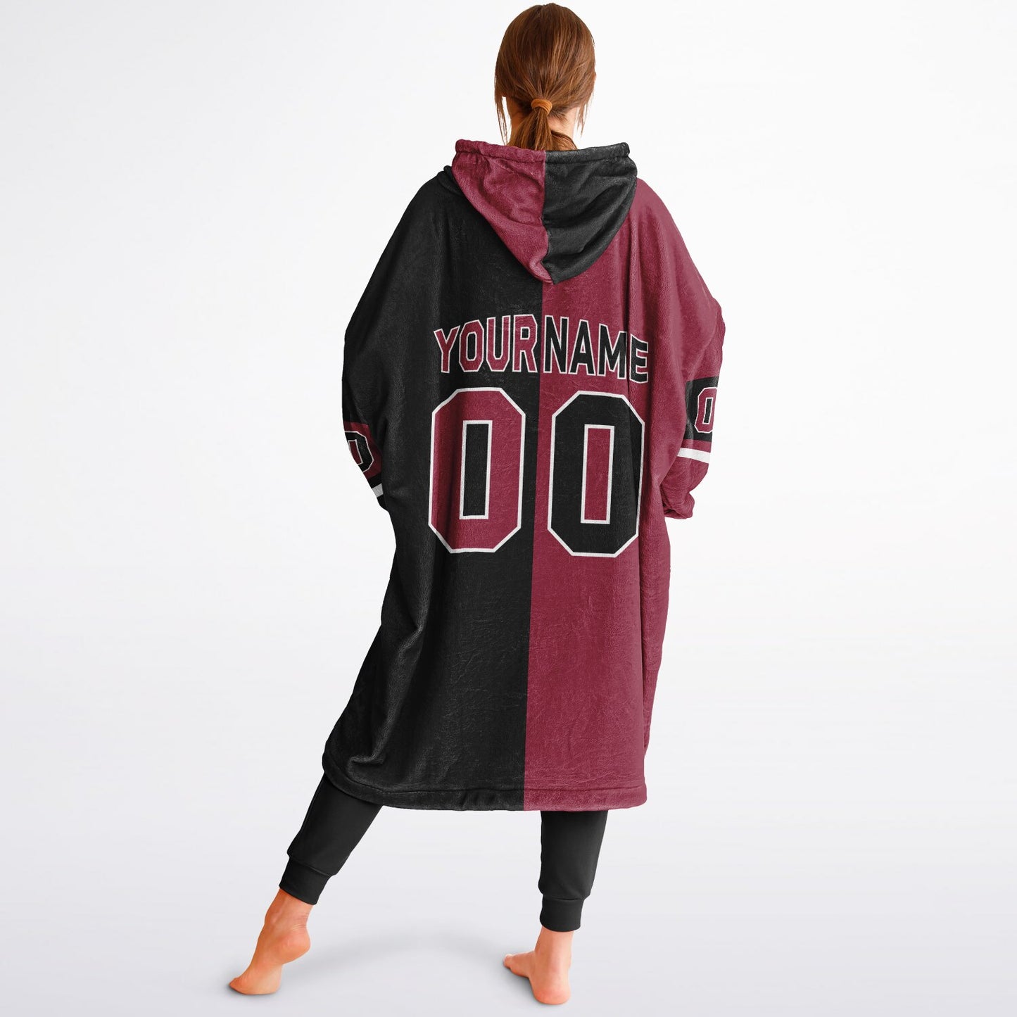 Cardinal red, black, and white halftime snug hoodie with three-tone split design and cozy fleece texture.