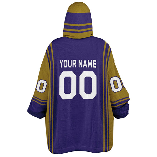 Purple and metallic gold bold snug hoodie with modern color-block design and soft loungewear fit.
