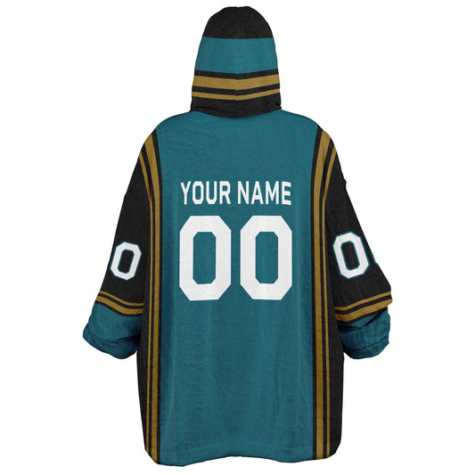 Teal, black, and gold bold snug hoodie with triple color blocking and a sporty aesthetic.