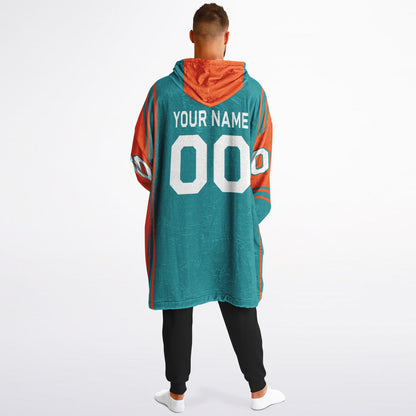 Aqua and orange bold snug hoodie with modern color-block design and soft loungewear fit.