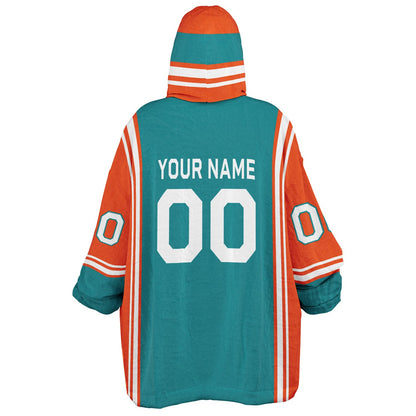 Aqua, orange, and white bold snug hoodie with triple color blocking and a sporty aesthetic.