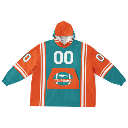 Aqua, orange, and white bold snug hoodie with triple color blocking and a sporty aesthetic.