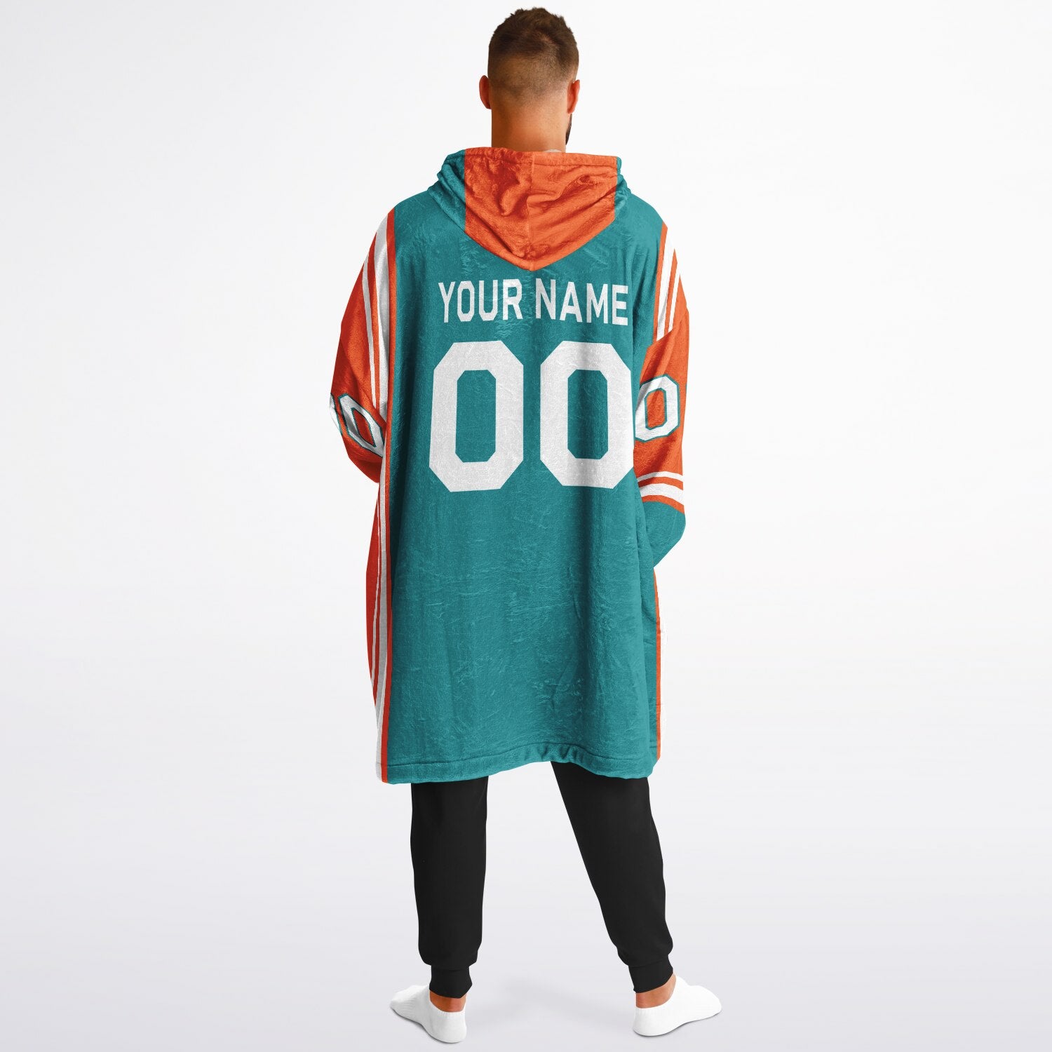 Aqua, orange, and white bold snug hoodie with triple color blocking and a sporty aesthetic.