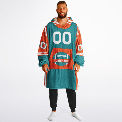 Aqua, orange, and white bold snug hoodie with triple color blocking and a sporty aesthetic.