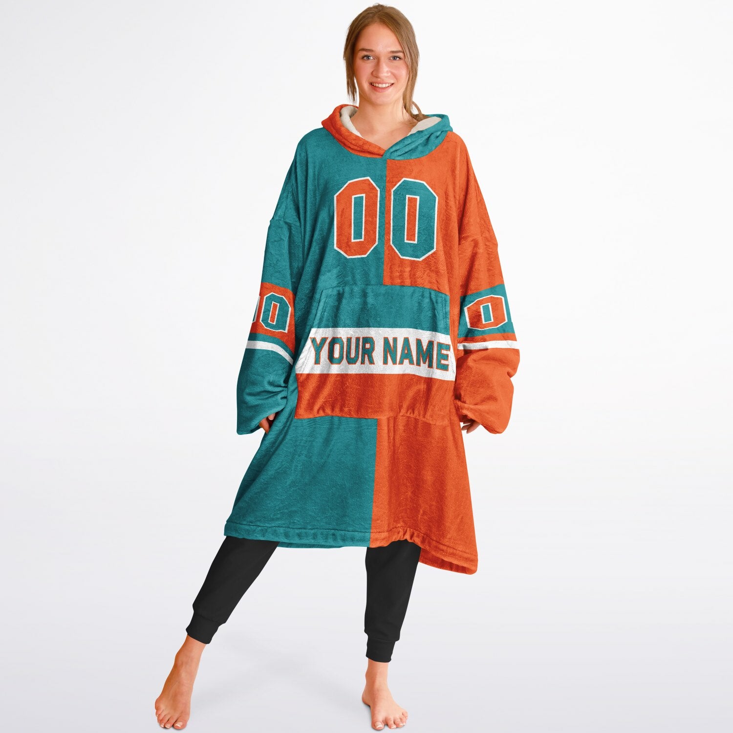Aqua, orange and white halftime snug hoodie with three-tone split design and cozy fleece texture.