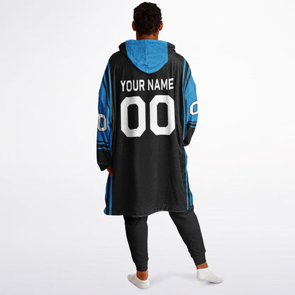 Black and blue bold snug hoodie with modern color-block design and soft loungewear fit.