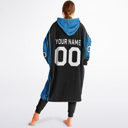 Black and blue bold snug hoodie with modern color-block design and soft loungewear fit.