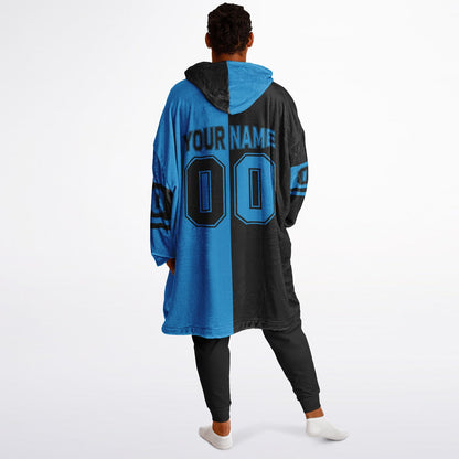 Black and blue halftime snug hoodie featuring a symmetrical split design for a dynamic game-day look.