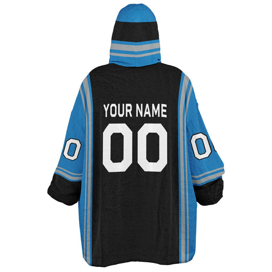 Black, blue, and silver bold snug hoodie with triple color blocking and a sporty aesthetic.