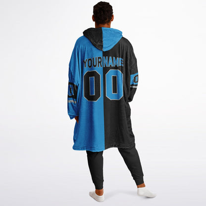 Black, blue, and silver halftime snug hoodie with three-tone split design and cozy fleece texture.