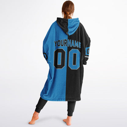 Black, blue, and silver halftime snug hoodie with three-tone split design and cozy fleece texture.