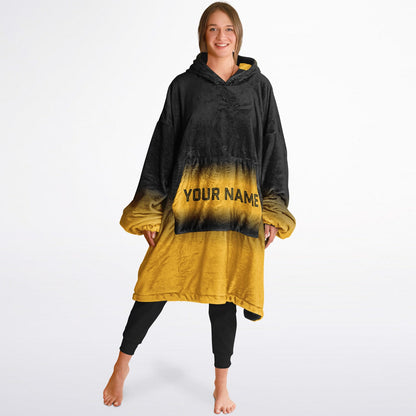 Black and gold reversible snug hoodie with soft interior lining and casual everyday style for football fans.