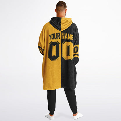 Black and gold halftime snug hoodie featuring a symmetrical split design for a dynamic game-day look.