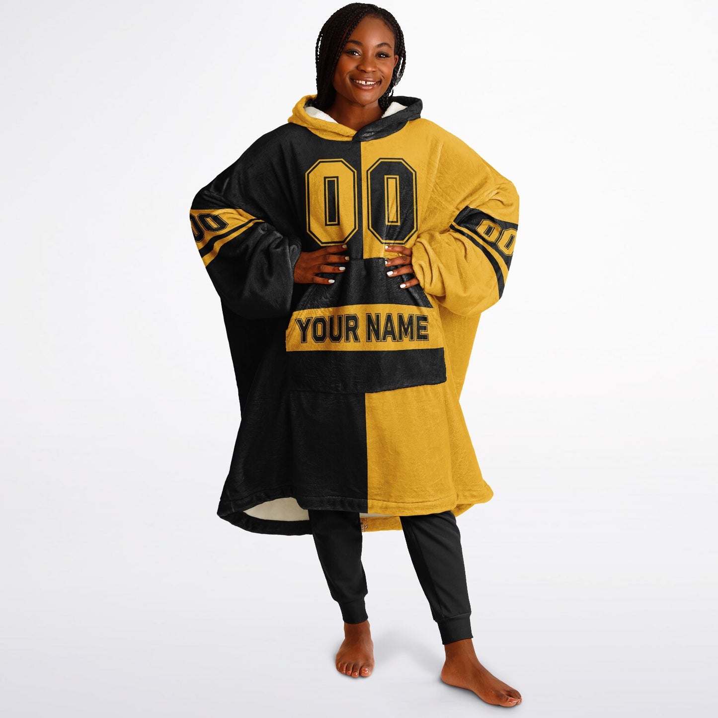 Black and gold halftime snug hoodie featuring a symmetrical split design for a dynamic game-day look.