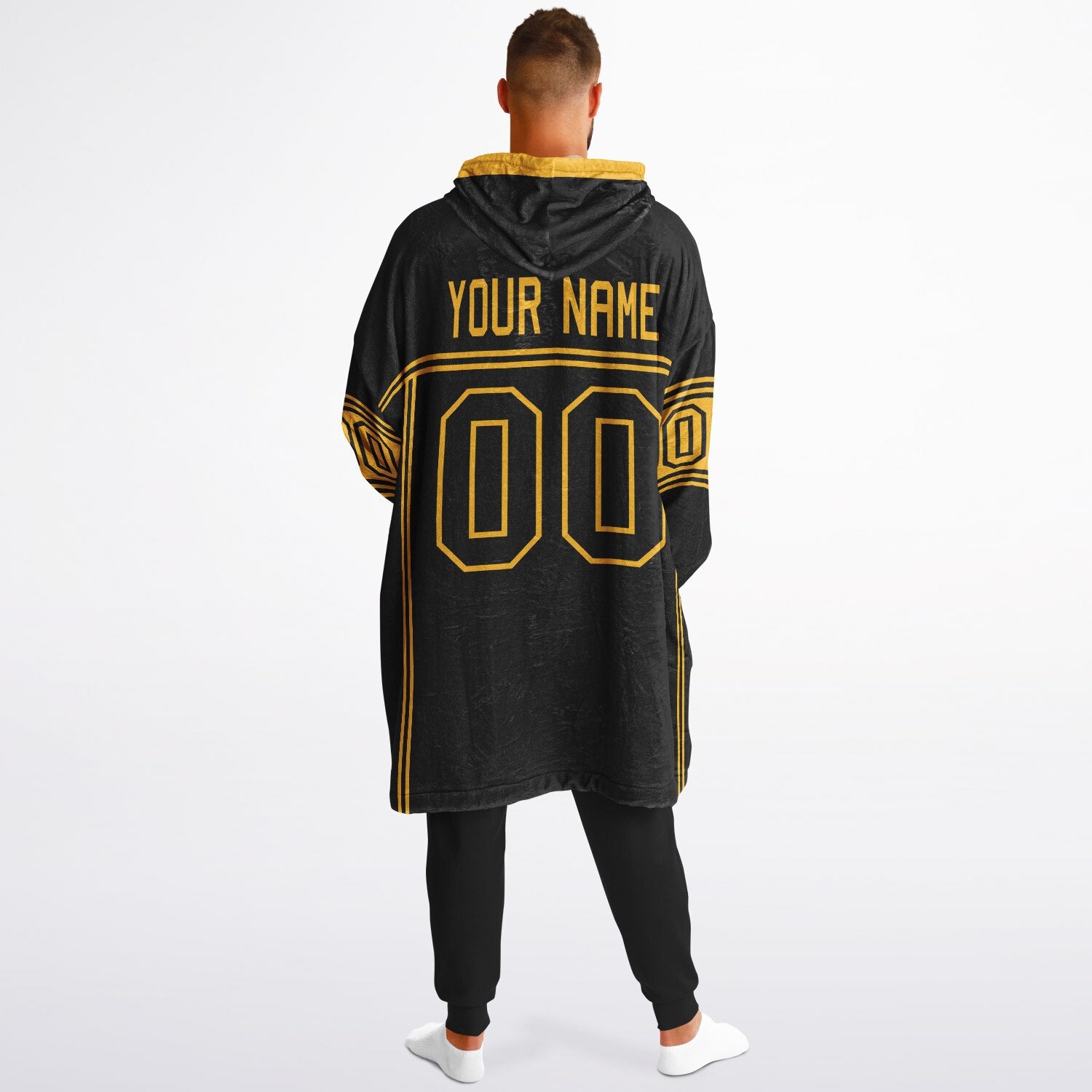 Black and gold lineup snug hoodie featuring sleek line-art details and minimalist team-inspired design.