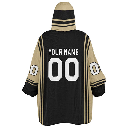 Black and old gold bold snug hoodie with modern color-block design and soft loungewear fit.