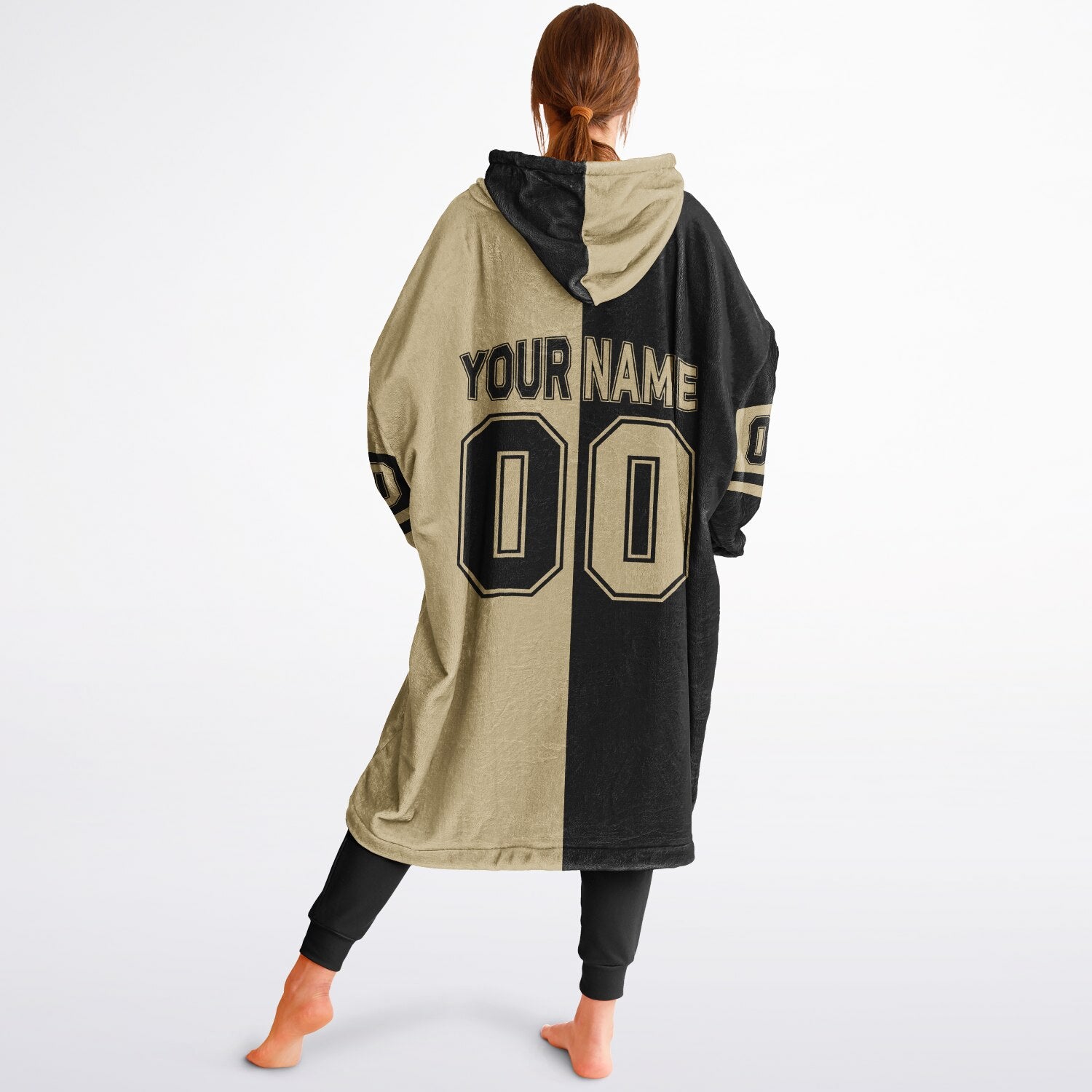 Black and old gold halftime snug hoodie featuring a symmetrical split design for a dynamic game-day look.