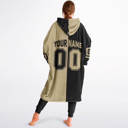 Black and old gold halftime snug hoodie featuring a symmetrical split design for a dynamic game-day look.