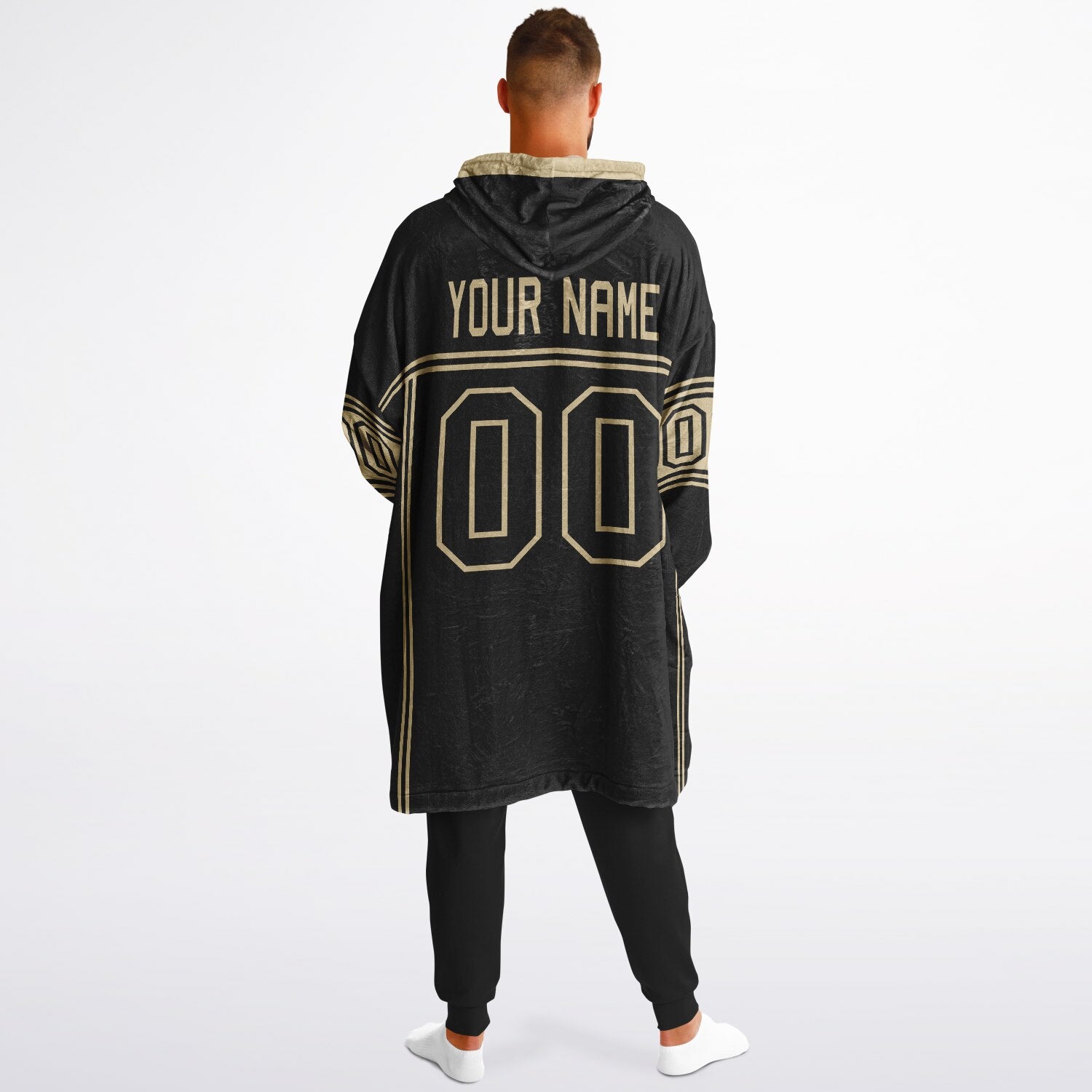Black and old gold lineup snug hoodie featuring sleek line-art details and minimalist team-inspired design.
