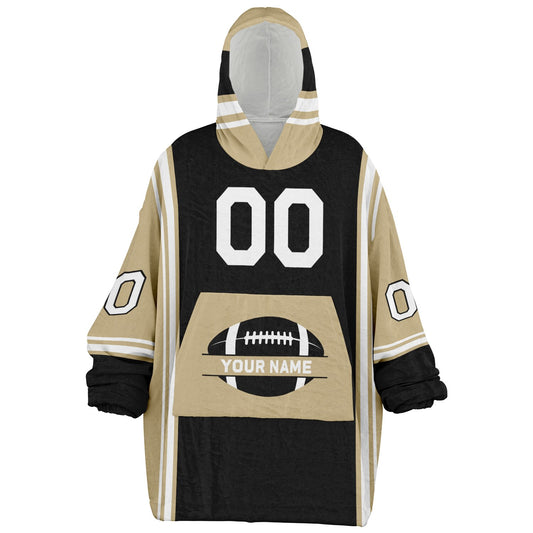 Black, old gold, and white bold snug hoodie with triple color blocking and a sporty aesthetic.