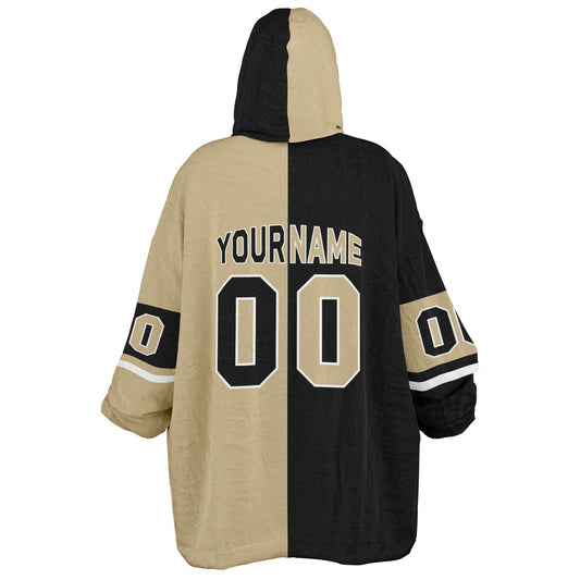 Black, old gold, and white halftime snug hoodie with three-tone split design and cozy fleece texture.