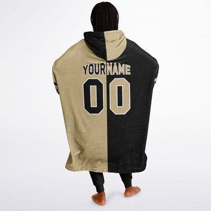 Black, old gold, and white halftime snug hoodie with three-tone split design and cozy fleece texture.