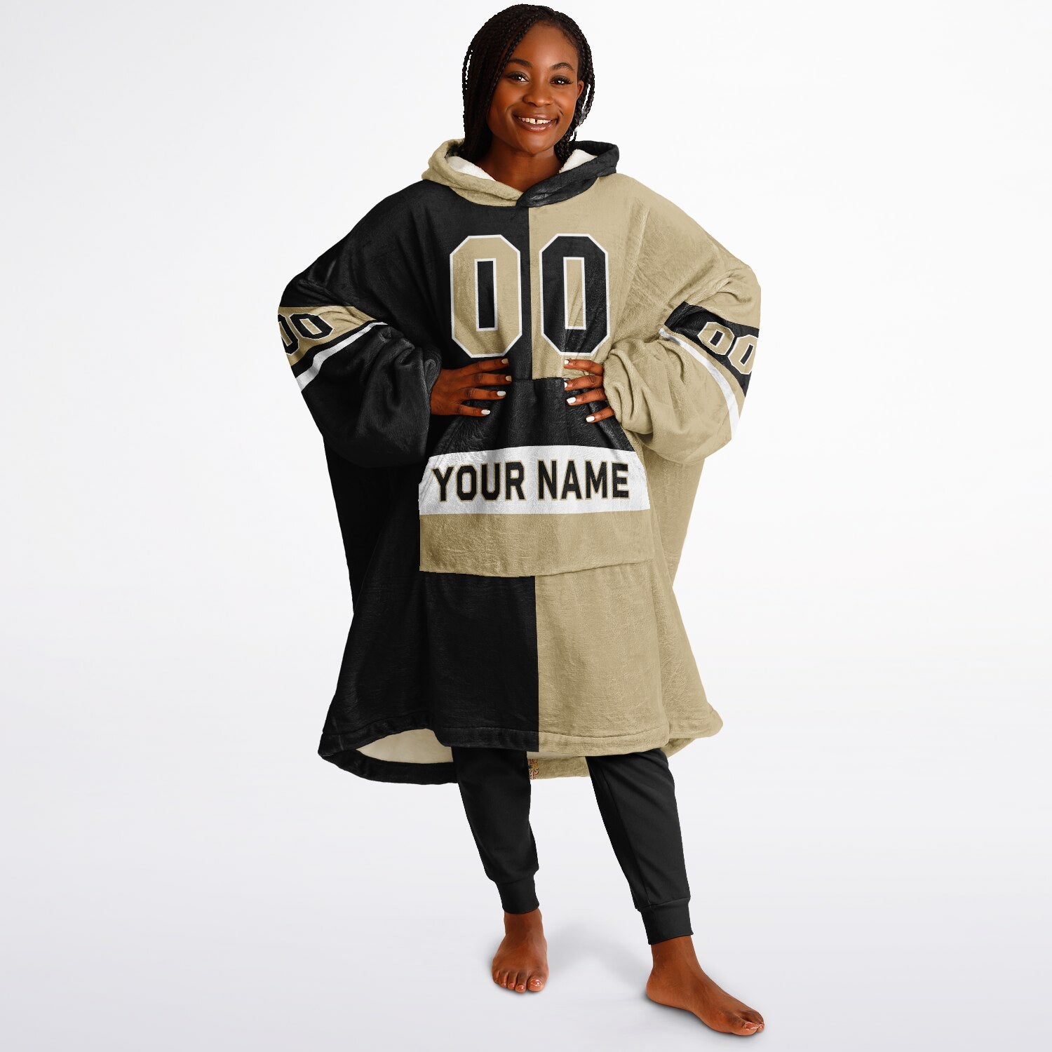 Black, old gold, and white halftime snug hoodie with three-tone split design and cozy fleece texture.
