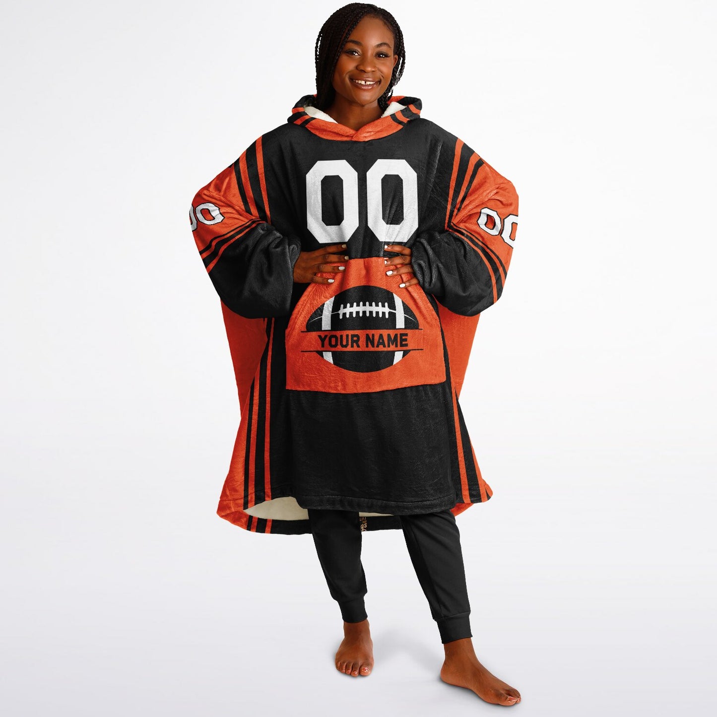 Black and orange bold snug hoodie with modern color-block design and soft loungewear fit.