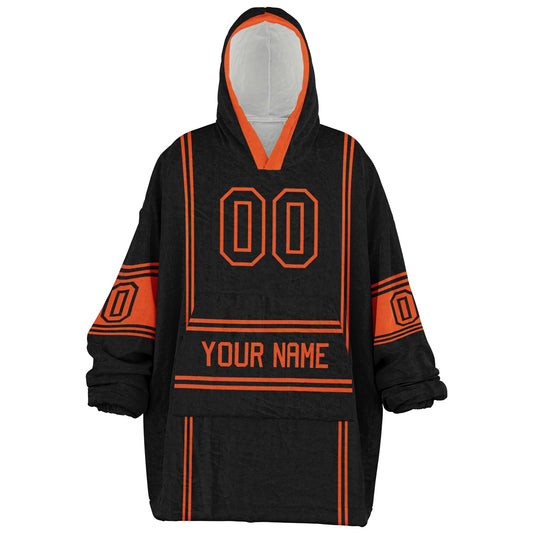Black and orange lineup snug hoodie featuring sleek line-art details and minimalist team-inspired design.