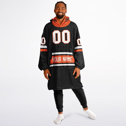 Black, orange, and white classic snug hoodie featuring authentic jersey striping and personalized number details.