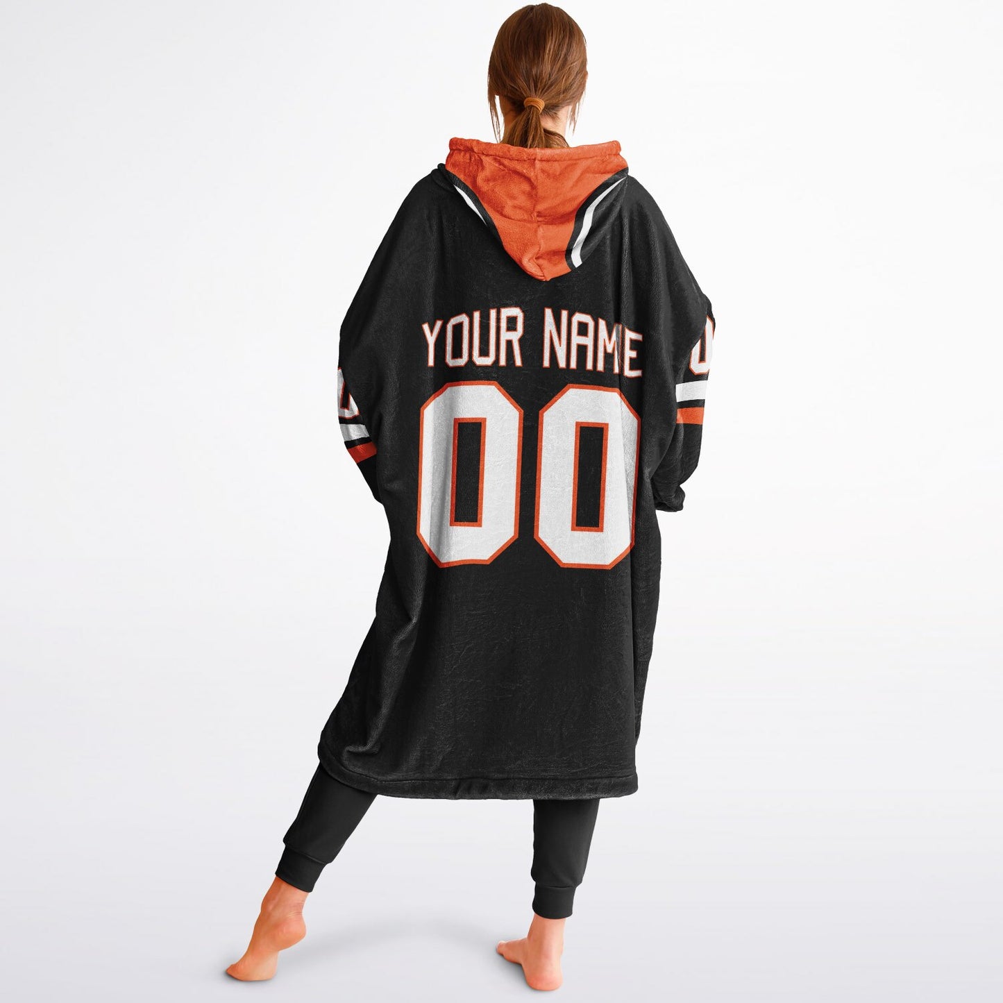 Black, orange, and white classic snug hoodie featuring authentic jersey striping and personalized number details.