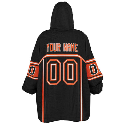 Black, orange, and white lineup snug hoodie with clean line work and subtle jersey influence.