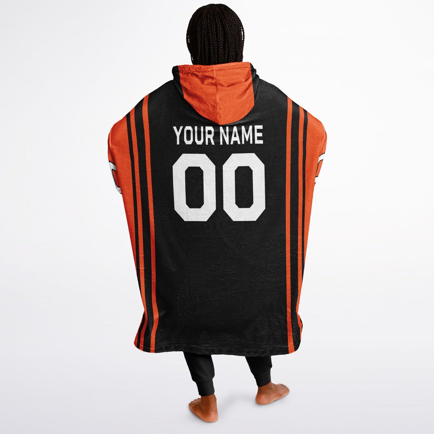 Black and orange bold snug hoodie with modern color-block design and soft loungewear fit.