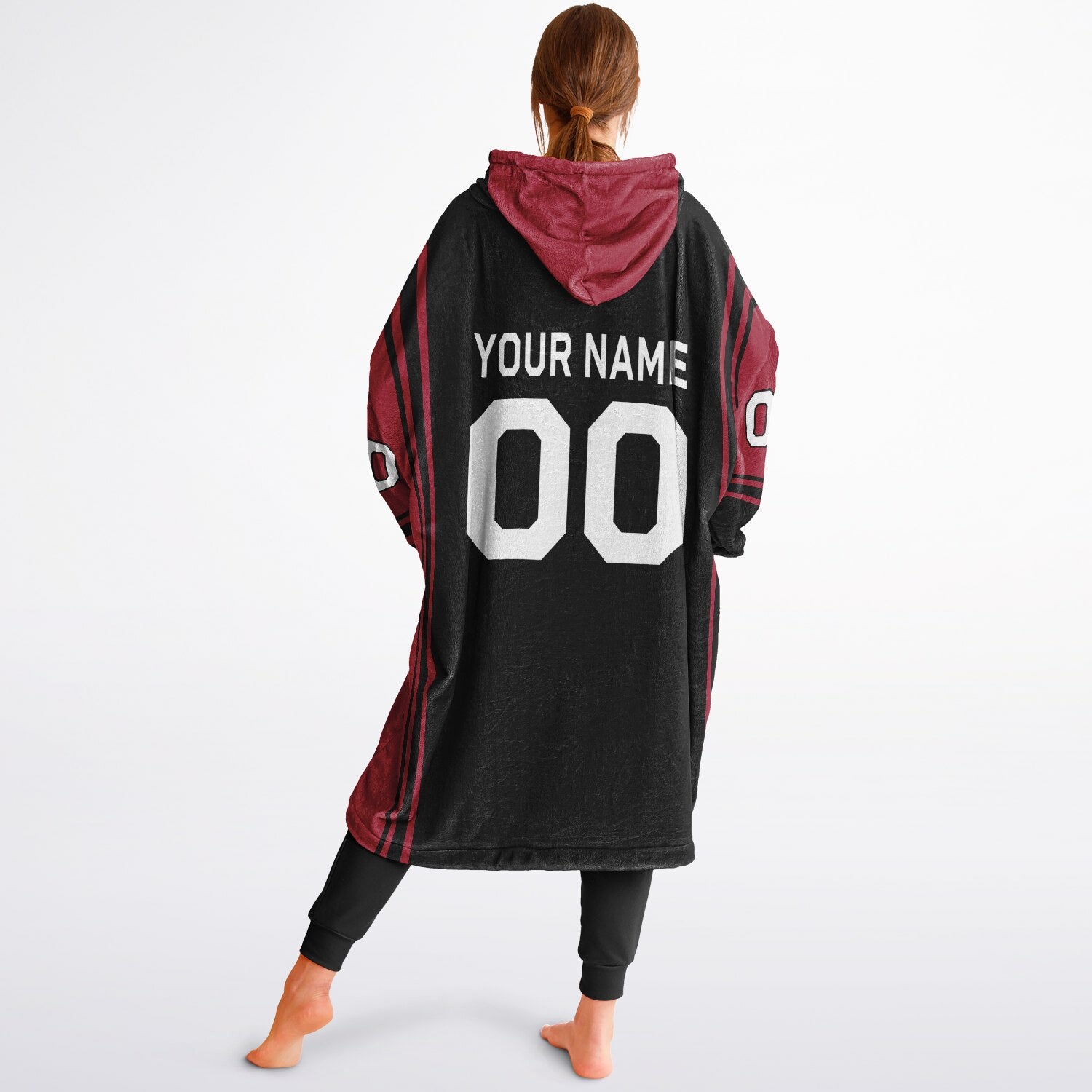 Black and red bold snug hoodie with modern color-block design and soft loungewear fit.