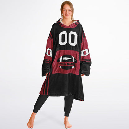 Black and red bold snug hoodie with modern color-block design and soft loungewear fit.