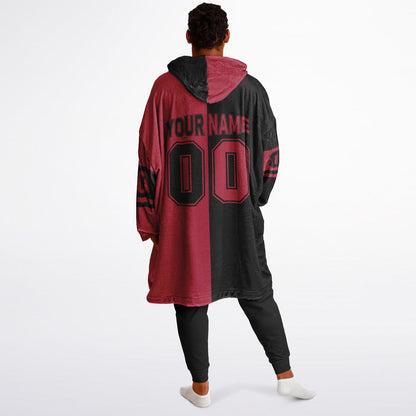 Black and red halftime snug hoodie featuring a symmetrical split design for a dynamic game-day look.