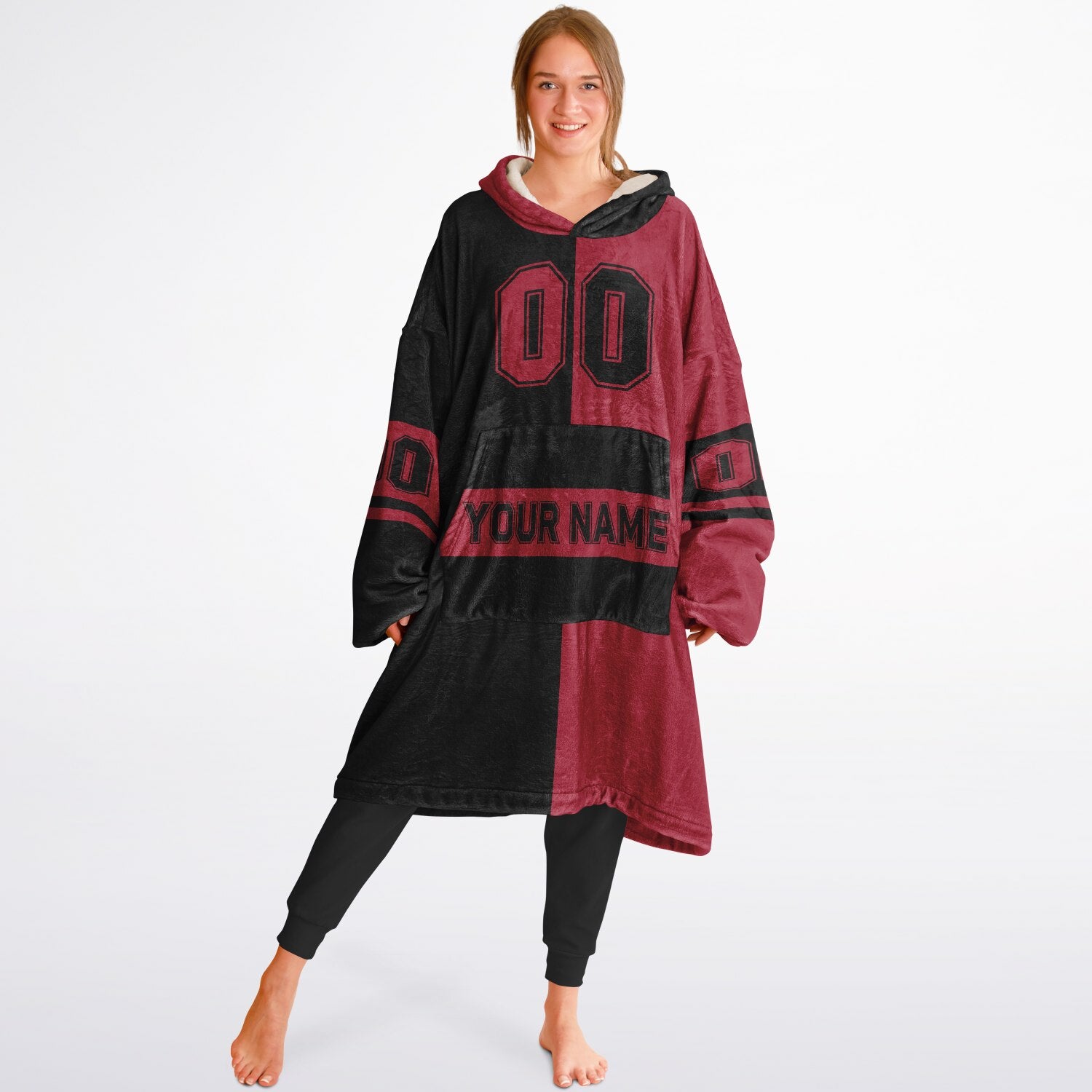 Black and red halftime snug hoodie featuring a symmetrical split design for a dynamic game-day look.