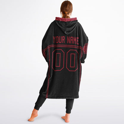 Black and red lineup snug hoodie featuring sleek line-art details and minimalist team-inspired design.