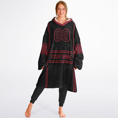 Black and red lineup snug hoodie featuring sleek line-art details and minimalist team-inspired design.