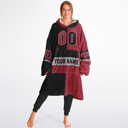 Black, red, and silver halftime snug hoodie with three-tone split design and cozy fleece texture.
