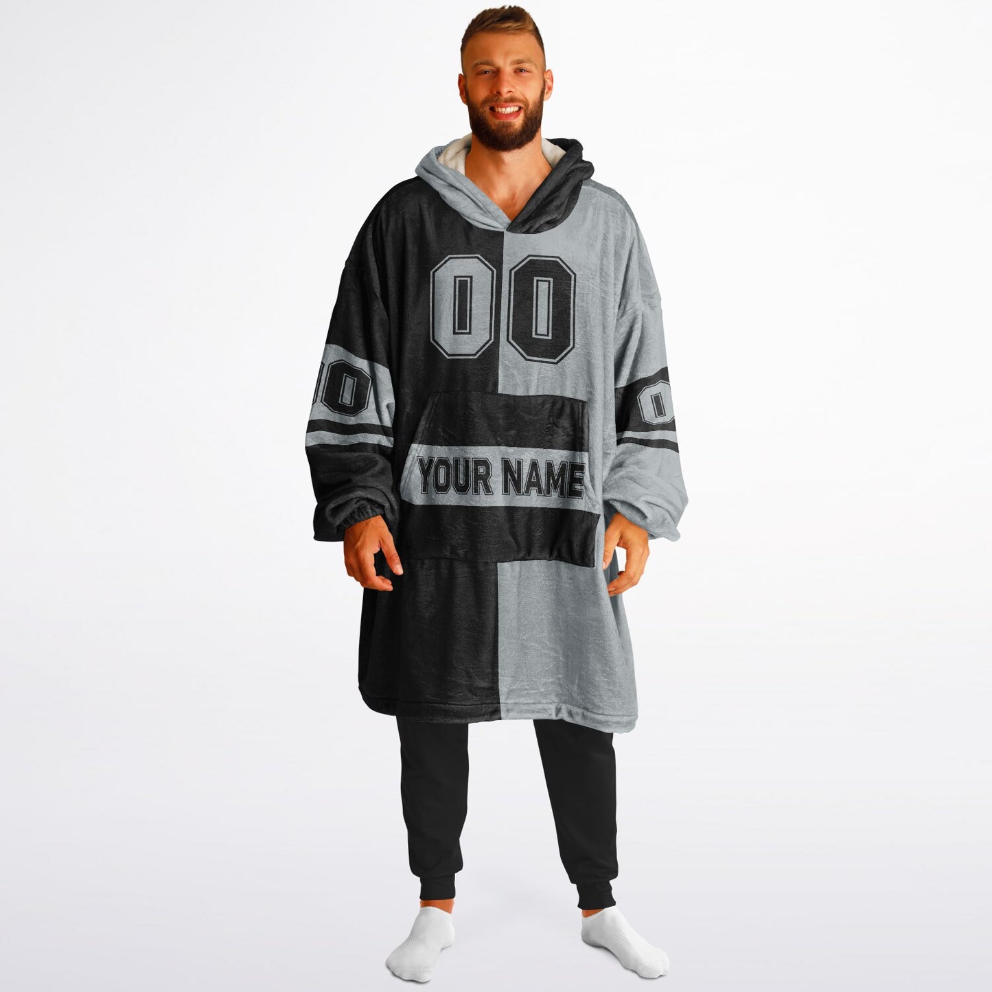 Black and silver halftime snug hoodie featuring a symmetrical split design for a dynamic game-day look.
