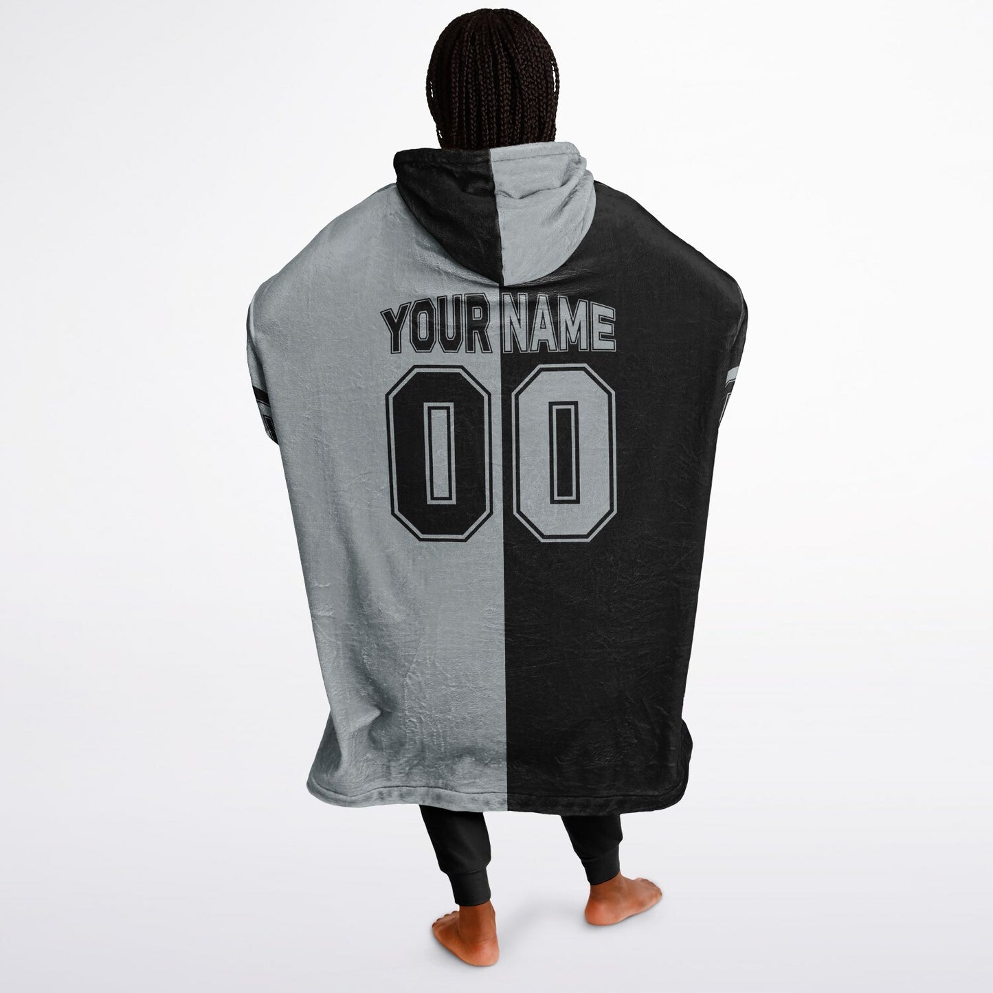 Black and silver halftime snug hoodie featuring a symmetrical split design for a dynamic game-day look.