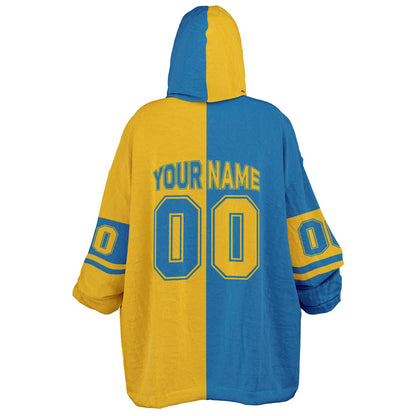 Blue and gold halftime snug hoodie featuring a symmetrical split design for a dynamic game-day look.