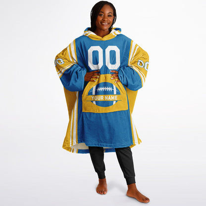 Blue, gold, and white bold snug hoodie with triple color blocking and a sporty aesthetic.