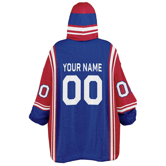 Blue, red, and white bold snug hoodie with triple color blocking and a sporty aesthetic.